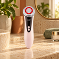 Massageador Facial 5 em 1 com LED, RF e Massagem Morna – Recarregável